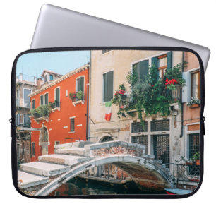 CONCRETE BRIDGE BESIDE WHITE BUILDING LAPTOP SLEEVE