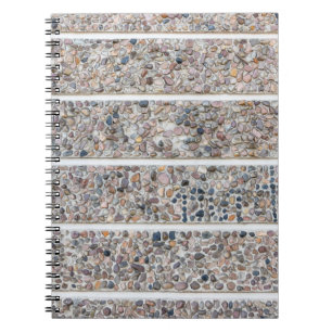 Concrete pebbles wall notebook