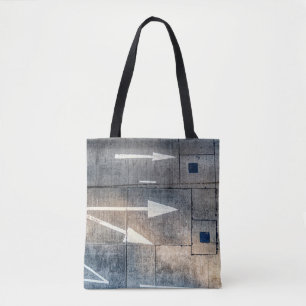 Concrete road with painted arrow directions tote bag