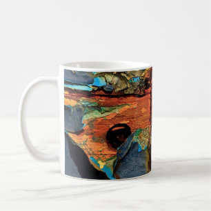 Concrete wall with abstract painting coffee mug