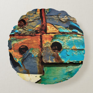Concrete wall with abstract painting round cushion