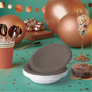 Confidently Against a Stylish Brown Wall Paper Plate