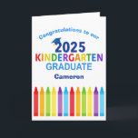 Congratulations Kindergarten Graduate Customisable Card<br><div class="desc">This adorable 2025 kindergarten graduation card features a cool grad cap above colourful writing and a row of crayons in rainbow. Cute customisable kindergartener graduate congratulations card in fun colours for the last day of elementary school with your kid's name personalised in blue. Congratulations to our kinder grad!</div>