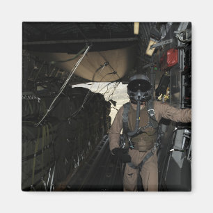 Container Delivery System bundles exit a C-17 Magnet