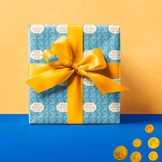 Contemporary Happy Hannukah Star of David  Wrapping Paper (Stars of David on blue background wrapping paper.)