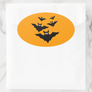 Cool cute Black Flying bats Halloween on Orange Oval Sticker