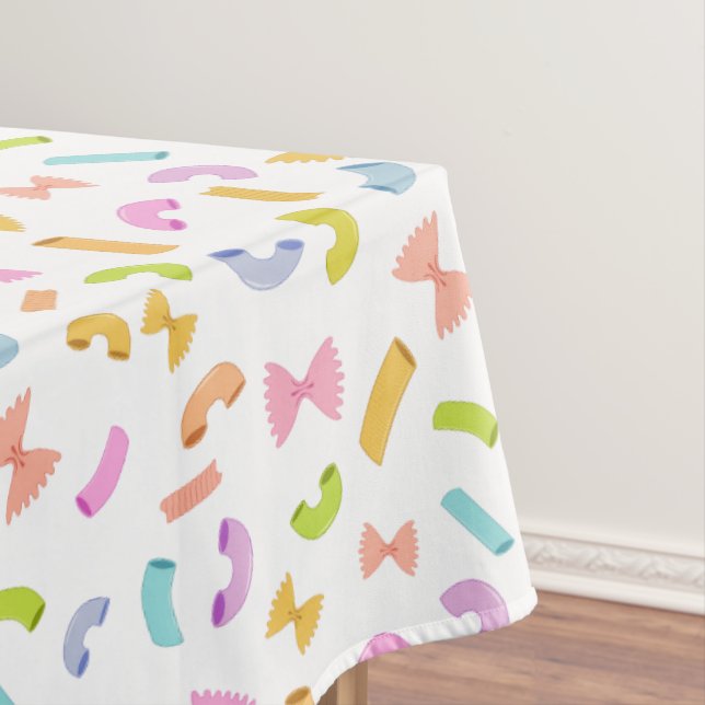 Cool fun pasta macaroni colourful pattern on white tablecloth (In Situ)
