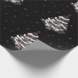 Cool Goth Design with Tree and Skulls Wrapping Paper<br><div class="desc">Cool and totally different wrapping paper. Black background,  purple snowflakes and trees in grey,  purple and white with little skulls on them.  Kinda Goth,  very different for the holidays.

From Scarebaby Design,  backed by the Zazzle guarantee.</div>