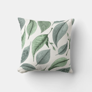 Cool grey green leaves on white cushion
