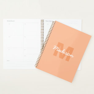 Cool pastel peach colour with Custom Monogram name Planner