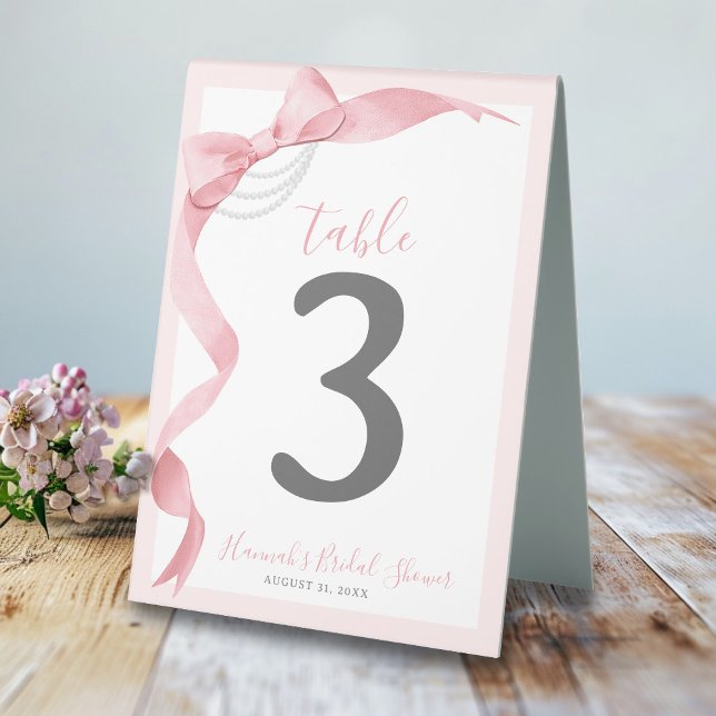 Coquette Pink Bow & Pearls Bridal Shower Welcome (Cute coquette pink and white watercolor bows and pearls girly wedding bridal shower table number)