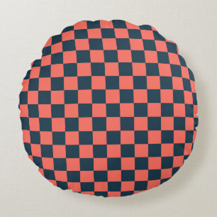 Coral and navy chequerboard pattern round cushion