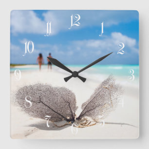 Coral branch at the beach square wall clock
