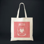 Coral mason jar wedding tote bag for bridesmaids<br><div class="desc">Vintage mason jar wedding tote bag for bridesmaids. Rustic design for country chic marriage. Coral pink or custom background colour. Stylish script typography for personalised name or monogram. Make one for elegant bride, bridesmaid, maid of honour, flower girl, mother of the bride etc. Includes romantic faded weathered heart. Pretty distressed...</div>