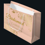 Coral Peach & Gold Lace Elegant Bridesmaid Large Gift Bag<br><div class="desc">This beautiful gift bag is designed as a wedding gift or favour bag for Bridesmaids. It features an elegant coral peach or pale orange and gold design with golden lace frills in the corners the text "Bridesmaid" as well as a place to enter her name, the couple's name, and the...</div>