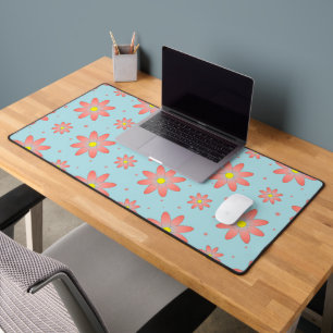 Coral pink and powder blue delicate daisy flowers  desk mat