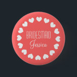 Coral pink bridesmaid button with white hearts<br><div class="desc">Personalised coral pink and white bridesmaid buttons with hearts and elegant font. Great for bachelorette party,  bridal shower and beautiful weddings. Classy round design. Posh and cute! Make your own for maid of honour,  matron of honour,  flower girl,  mother of the bride etc.</div>