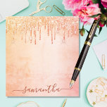 Coral rose gold pink glitter marble glam monogram notepad<br><div class="desc">A coral, rose gold, pink rustic marble background. Decorated with golden and rose gold faux glitter dripping, paint drip look. Personalise and add your name. The name is written with a large modern hand lettered style script. Dark coral coloured letters. To keep the swashes only delete the sample name, leave...</div>