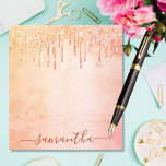 Coral rose gold pink glitter marble glam monogram notepad<br><div class="desc">A coral, rose gold, pink rustic marble background. Decorated with golden and rose gold faux glitter dripping, paint drip look. Personalise and add your name. The name is written with a large modern hand lettered style script. Dark coral coloured letters. To keep the swashes only delete the sample name, leave...</div>