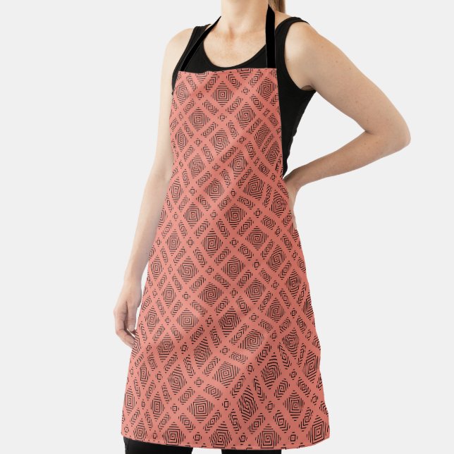 Coral with black geometric pattern apron (Insitu)