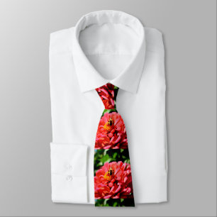 Coral zinnia with bumblebee tie