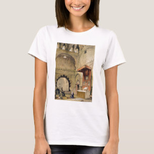 Cordoba: Monk praying at a Christian altar in the T-Shirt