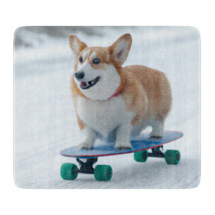 corgi skateboarding winter joy cutting board