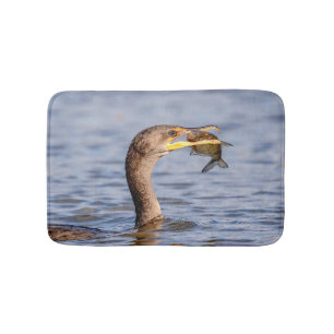 Cormorant with a fish bath mat