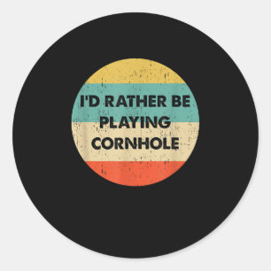 Cornhole I'd Rather Be Playing Cornhole Classic Round Sticker