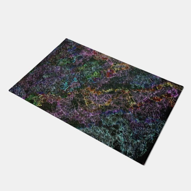 Corroded or destroyed dark coloured sponge doormat (Angled)