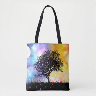 Cosmic swirling clouds with sun moon and tree tote bag