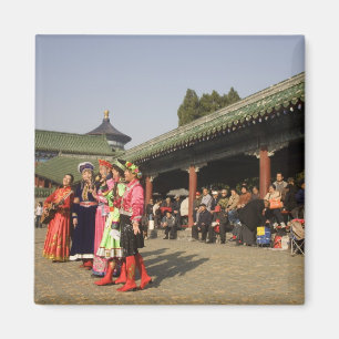 Costumed amateur folk dancers entertain magnet