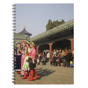 Costumed amateur folk dancers entertain notebook