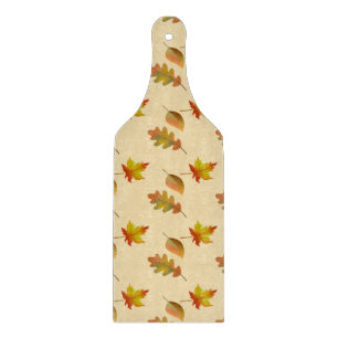 Cosy autumn maple leaves oak leaves  cutting board