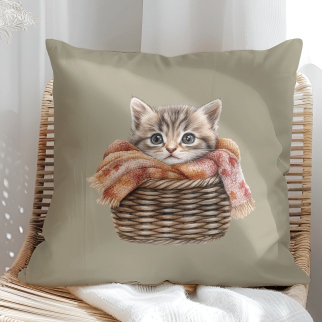 Cosy Basket Cat Pillow – Olive Taupe Edition (Cozy Basket Cat Pillow – Olive Taupe Edition in a sunny boho rattan chair.)