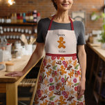 Cosy Christmas Gingerbread Man Grammie's Kitchen Apron<br><div class="desc">This festive design was created using my sweet Scandinavian inspired cookies shaped like a gingerbread man, a Christmas tree, and a star surrounded by citrus, dried spices, greenery, and berries that evoke the feel of a warm cottage kitchen at grandma's filled with the scents of holiday baking! The bottom is...</div>