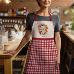 Cosy Christmas Red Hand Drawn Gingham Gingerbread  Apron<br><div class="desc">This festive design was created using my sweet wreath of Scandinavian inspired cookies shaped like a gingerbread man, a Christmas tree, and a star surrounded by citrus, dried spices, greenery, and berries that evoke the feel of a warm cottage kitchen at grandma's filled with the scents of holiday baking! The...</div>
