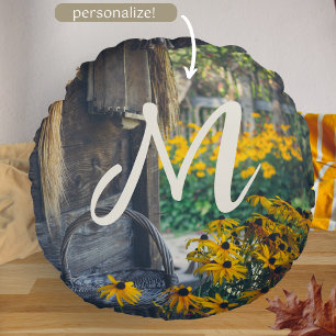 Cosy country cottage with yellow flowers round cushion