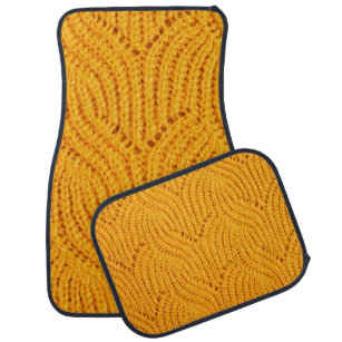 Cosy fall vibes: textured orange sweater backgroun car mat