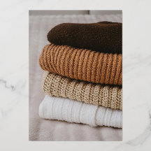 Cosy Stack of Warm Knitted Winter Sweaters