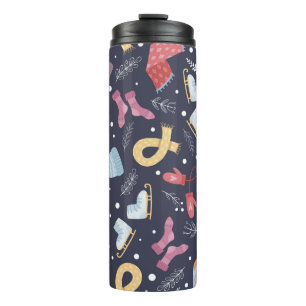 Cosy winter things on a blue background. Knitted c Thermal Tumbler