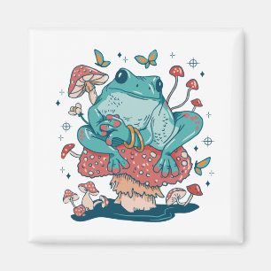 Cottagecore frog on mushroom house magnet