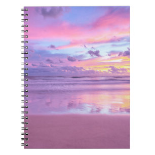 Cotton candy sunrise: beach view. notebook