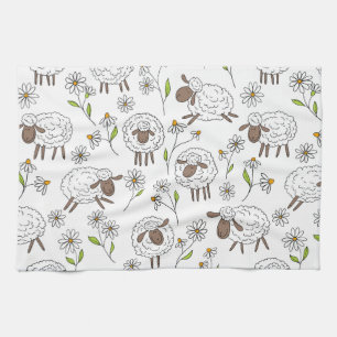 Counting sheep on white tea towel