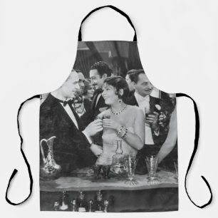 Couple having drink at crowded bar apron