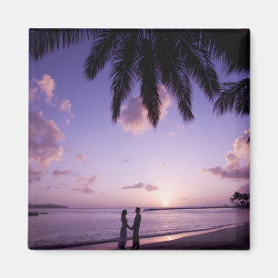Couple on beach, Windjammer Landing, St. Lucia Magnet
