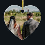 Couple Photo Quote Who You Have Beside You Heart Ceramic Ornament<br><div class="desc">A heart shape ornament with romance in mind for any time of the year! Easily swap in your favourite picture of the two of you on the front and on the back lovely words It doesn’t matter where you go It’s who you have Beside You. You can personalise the words...</div>