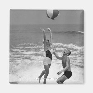 Couple Playing with a Beachball Magnet