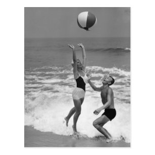 Couple Playing with a Beachball Postcard