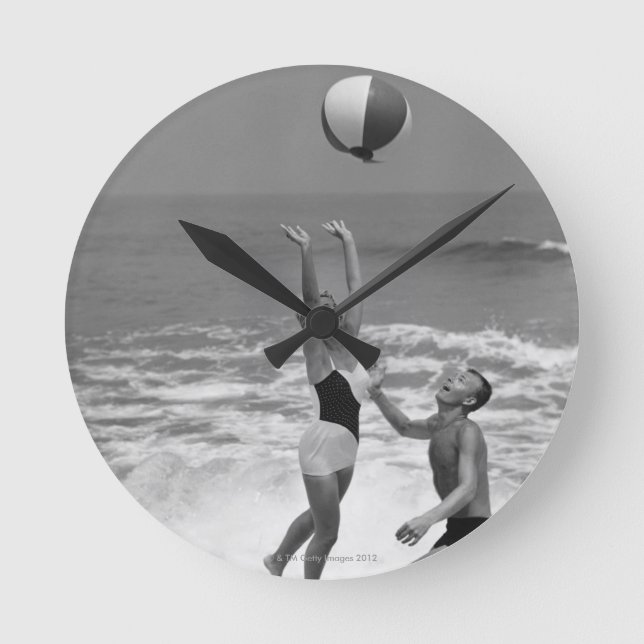 Couple Playing with a Beachball Round Clock (Front)